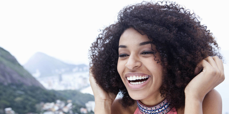 Close up portrait of happy young woman, Casa Alto Vidigal, Rio De Janeiro, Brazil